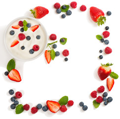 Yogurt with mixed berries, above view.