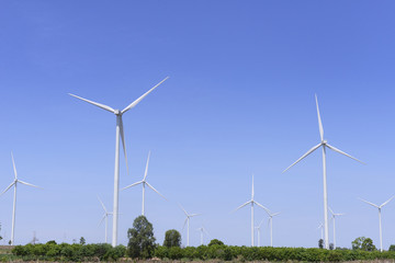 Fototapeta premium The big wind turbine farm with the blue sky