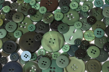 Green sewing buttons background
