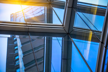 Obraz premium Directly Below Shot Of glass Skylight in a modern building.