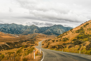 Straight empty highway leading into Aoraki-Mount Cook