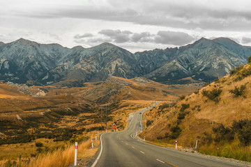 Straight empty highway leading into Aoraki-Mount Cook