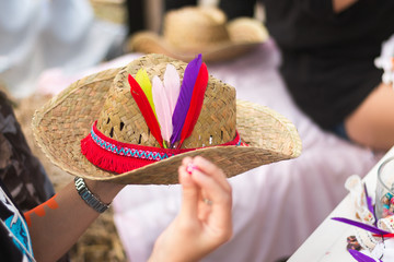 Decor hat with colorful feather and bead for bohemain style. Selective focus