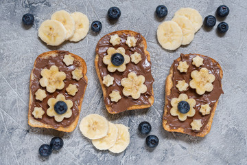 Toast bread with chocolate spread and banana