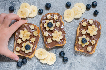 Toast bread with chocolate spread and banana