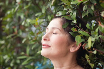 Woman in green garden 