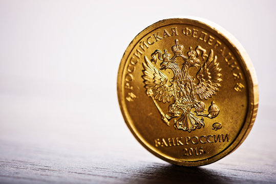 The Russian rouble coin on the desk