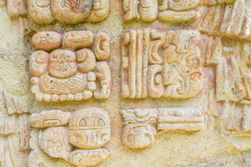 Carved stones at the  Mayan ruins in Copan Ruinas, Honduras