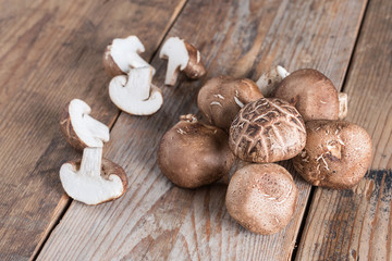 Shiitake mushroom on wooden table.