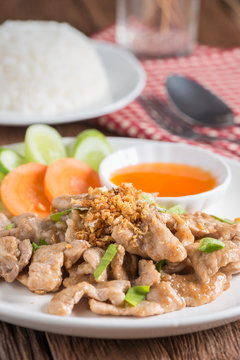 Close up, Fried pork with garlic and rice.