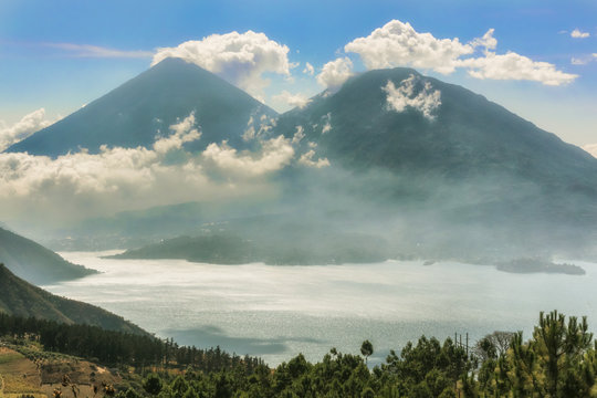 Landscape of volcanoes surrounding lake Atitlan in Guatemala.