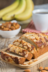 Banana cake topping with almond slice. Selective focus.