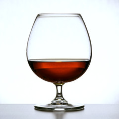 glass of brandy and chocolate pieces