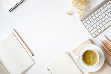 Workspace and office stuff on white desk table with copy space. For graphic or text montage.