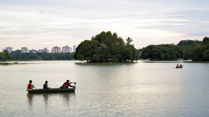 Fototapeta na wymiar Putrajaya, Malaysia-3 April 2017: Sports activities kayak is one of the focal point of activities on Lake Watland here every evening and holidays.