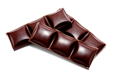 Dark chocolate bars stack isolated