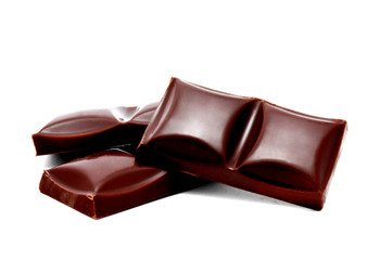 Dark chocolate bars stack isolated