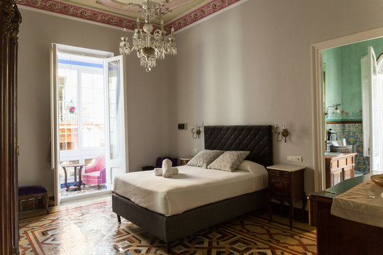 Bedroom with elegant interior and balcony