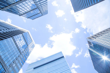 Fototapeta na wymiar Business buildings against blue sky