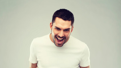 angry man over gray background