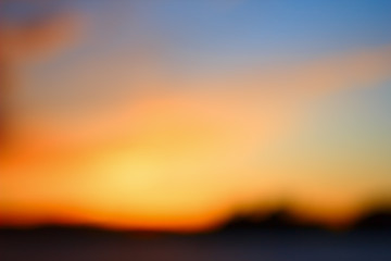 Blurred sunset on the lake