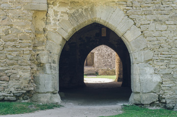 Fototapeta na wymiar Ancient arch doorway of medieval castle