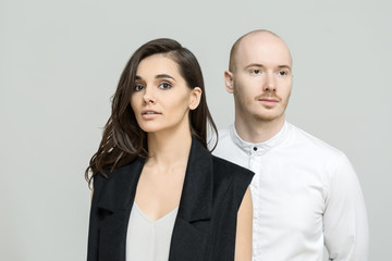 Bearded man with woman in studio