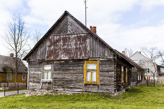 Abandoned wooden house in the village. The house is built of spruce beams. Joining the walls at the corners  through dovetail joint . Region Podlasie, Poland.