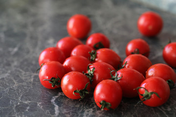 Fresh bright and juicy tomatoes on the kitchen