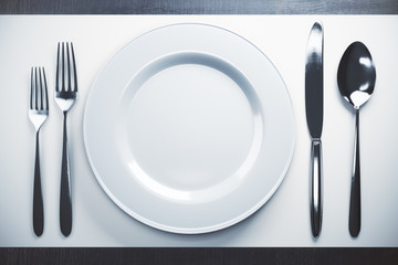 Empty plate and cutlery