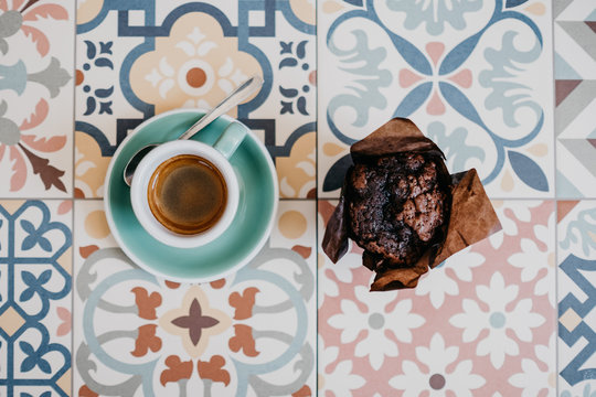 Muffin and espresso cup