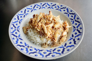 Crab meat fried with garlic top on rice in Thai style cuisine food