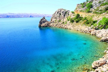 Turquoise Adriatic sea and rocky coast in Karlobag, Croatia