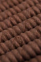 Chocolate waffle rolls in a row