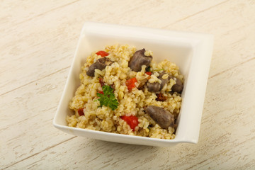 Bulgur with chicken hearts