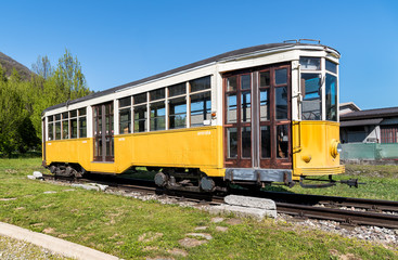 Fototapeta na wymiar Yellow vintage tram on tracks 