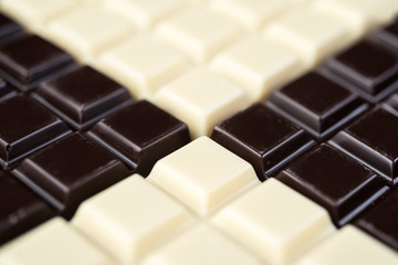 Dark and white chocolate bars combined together