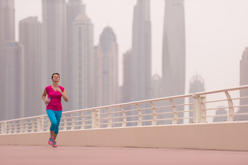 woman running on the promenade