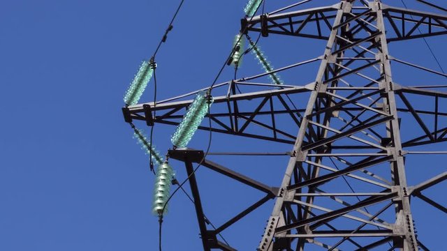 Electric support with insulators of high voltage wires. Industrial production of electricity. Electrical networks of renewable energy