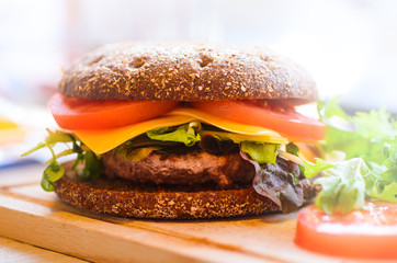 Homemade burger with beef and rye bread