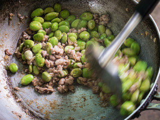 Cooking Parkia speciosa with pork Thai food.