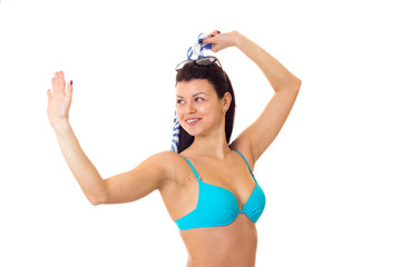 Woman in swimming suit with shawl and sunglasses