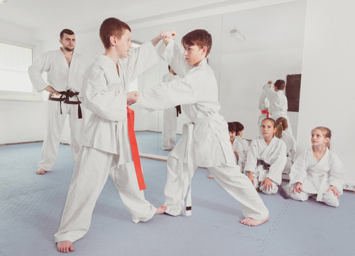 Pair of boys practicing new karate moves