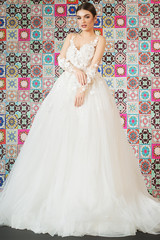 Beautiful model posing in a wedding dress