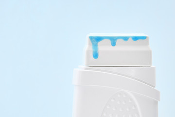 Depilatory wax cassette warmer. Flowing down waxing material