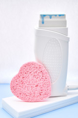 Depilatory wax cassette warmer with depilation wax paper, sponge. Flowing down waxing material
