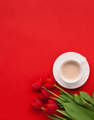 Bright red flowers and coffee