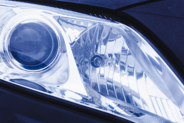 car headlights, red and blue. Garage theme