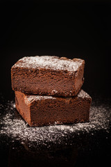 Chocolate Brownie dusted in Icing Sugar