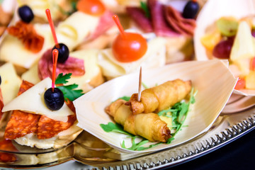 Home made canapes small sandwiches appetizers.